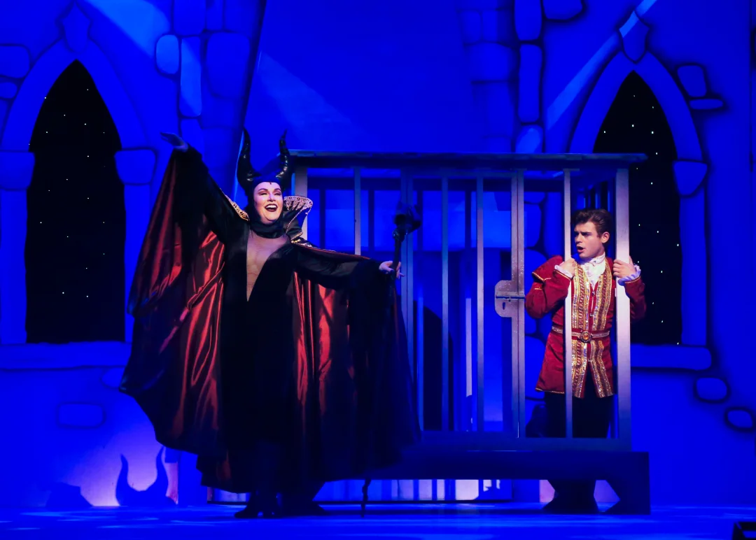 Debbie Gravitte as Carabosse Garrett and Clayton as the Prince in the TUTS 2017 production of Sleeping Beauty and Her Winter Knight. Photo by Melissa Taylor. Debbie Gravitte as Carabosse Garrett and Clayton as the Prince in the TUTS 2017 production of Sleeping Beauty and Her Winter Knight. Photo by Melissa Taylor.